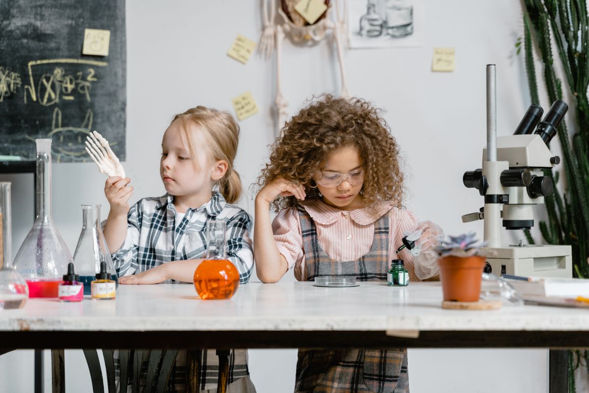 Illustrative photograph of children exploring science experiments